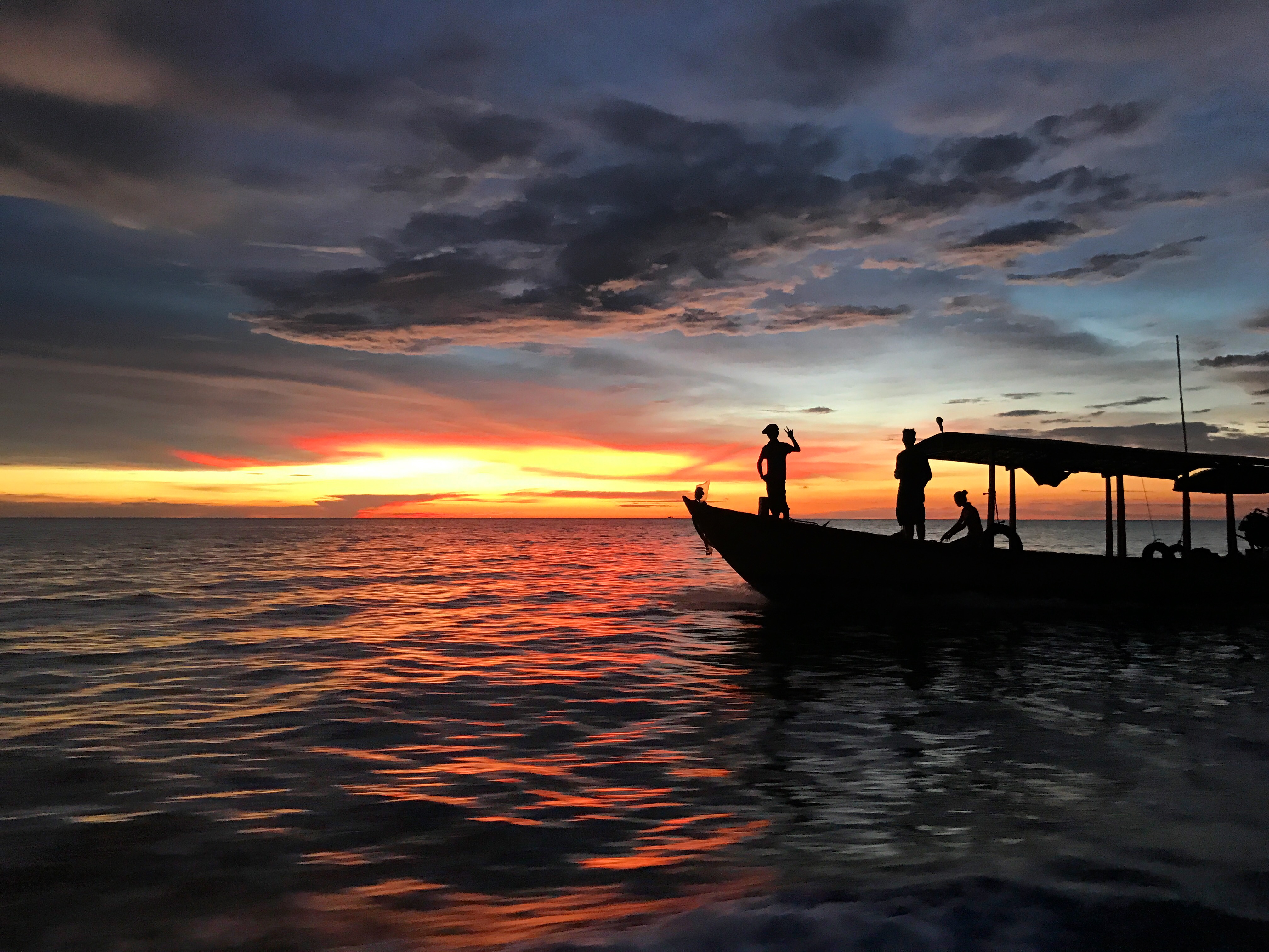 Boat race at sundown